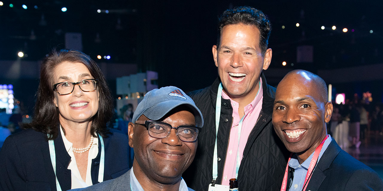 Four Liberty Associates posting together at Liberty event.